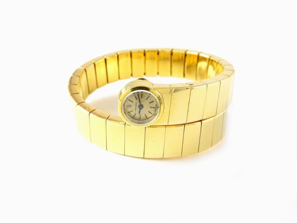 Yellow gold ladies Jaeger Le Coultre wristwatch with snake like bracelet