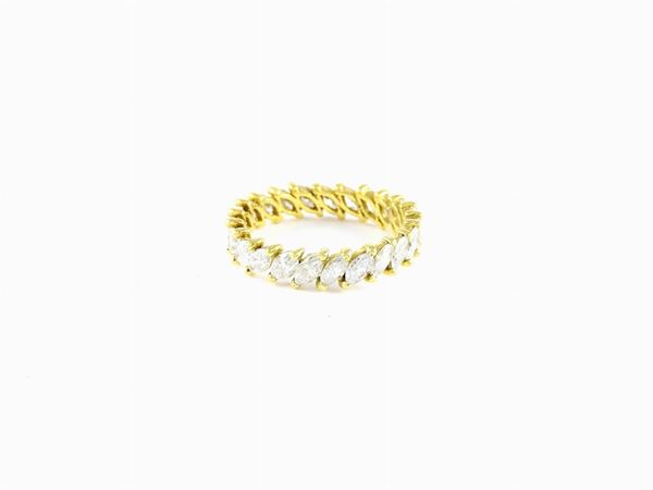 Yellow gold eternity ring with diamonds