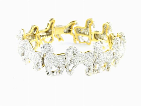 Bracciale animalier in oro giallo e bianco con diamanti