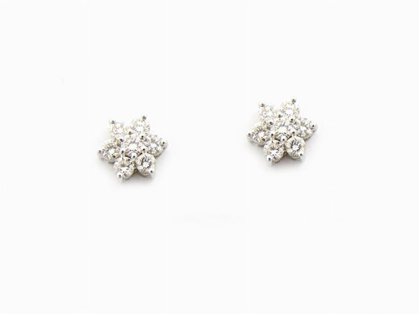 White gold daisy earrings with diamonds