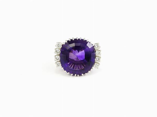 White gold ring with diamonds and amethyst quartz
