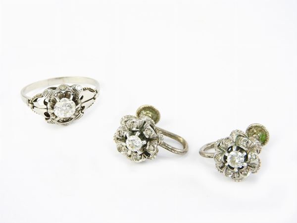 Demi parure of white gold ring and earrings with diamonds