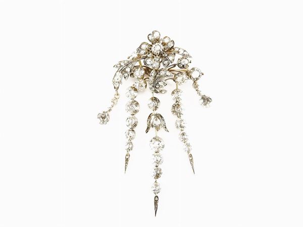 Silver and yellow gold brooch with diamonds
