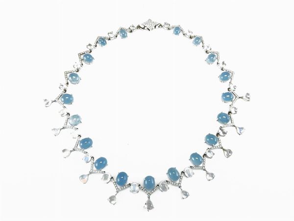 White gold necklace with diamonds, aquamarines and moonstones