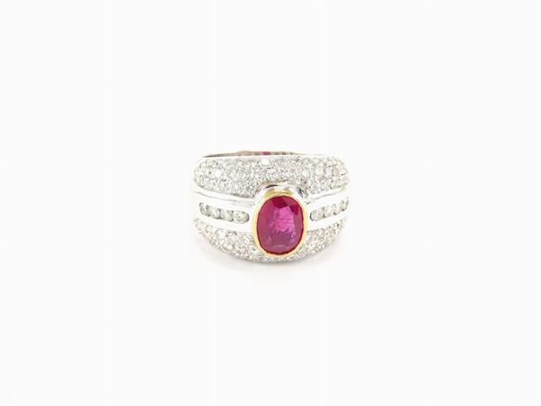 White and yellow gold band ring with diamonds and ruby