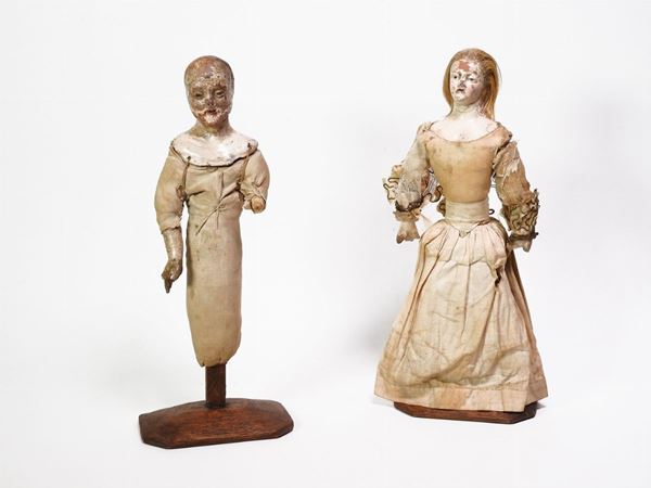 Two Polychrome Earthenware Dolls with Hemp Bodies
