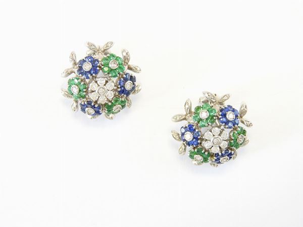 White gold earrings with diamonds, sapphires and emeralds