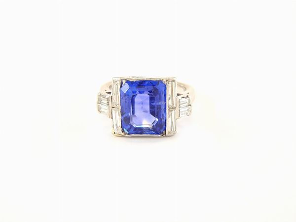 Platinum ring with natural sapphire and diamonds