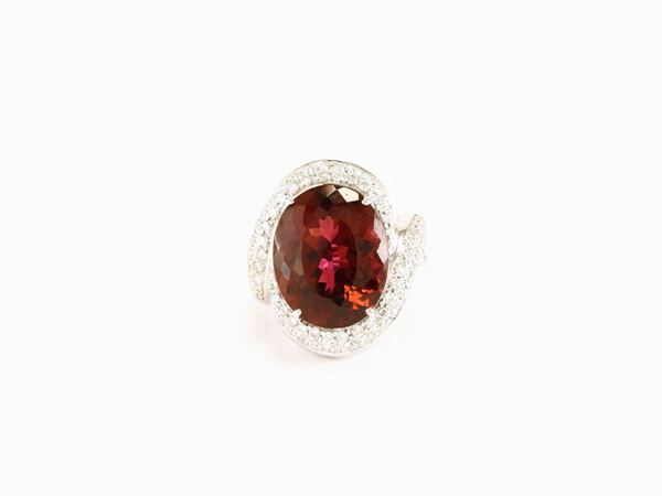 White gold ring with diamonds and pink tourmaline