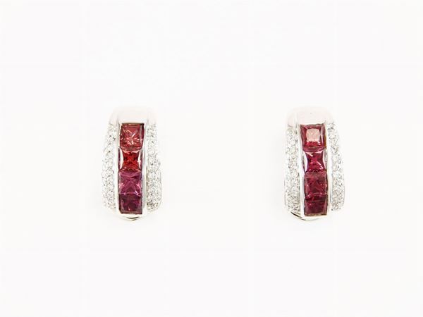 White gold earrings with diamonds and rhodolite garnets