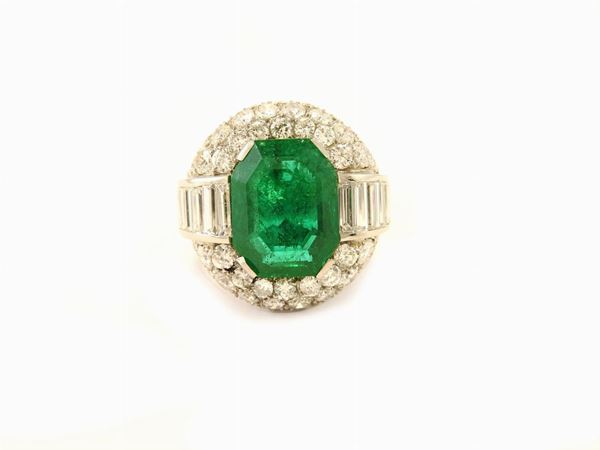 Platinum ring with diamonds and Columbian Old Mine emerald