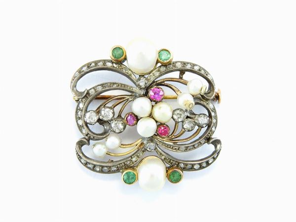 Silver and yellow gold brooch with diamonds, emeralds, rubies and likely natural pearls