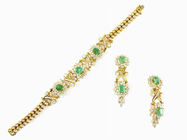 Demi parure of yellow gold bracelet and earrings with diamonds and emeralds