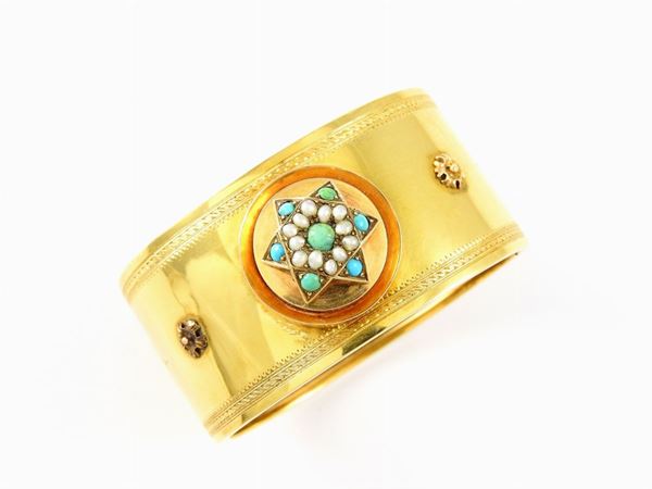 Yellow gold bangle with turquoises and half pearls