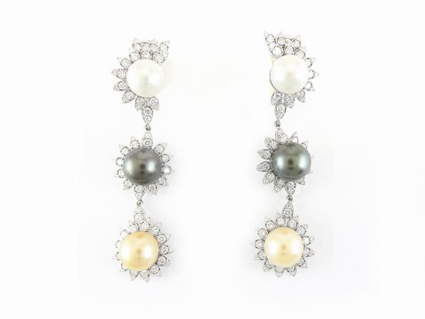 White gold ear pendants with diamonds and different colours South Sea pearls