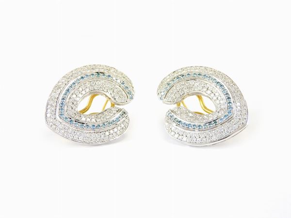White and yellow gold earrings with light blue and colourless diamonds