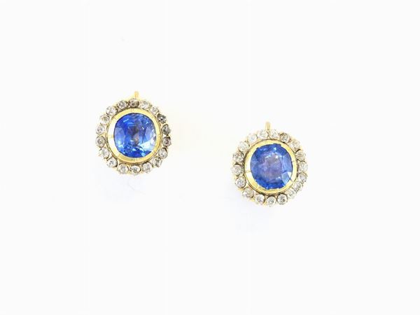 Yellow gold daisy earrings with diamonds and natural sapphires