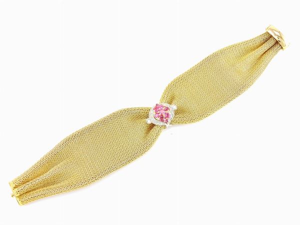 Yellow gold 1AR woven bracelet with white gold ornament set with diamonds and rubies