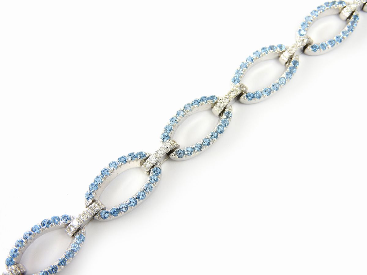 Bracciale in Oro Bianco, Diamanti e Topazi Azzurri