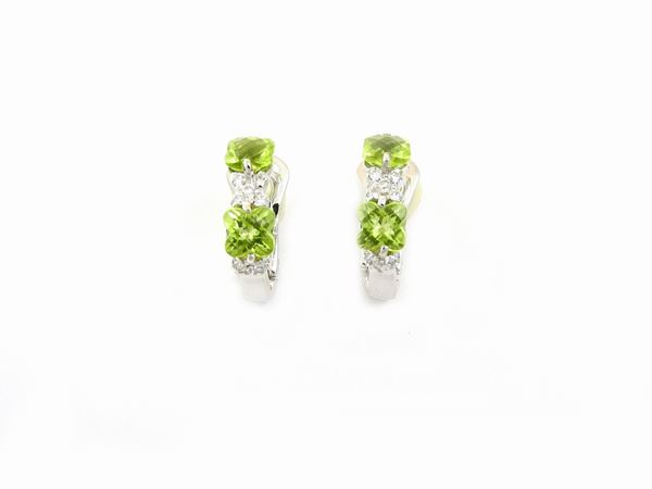 White gold earrings with diamonds and peridots