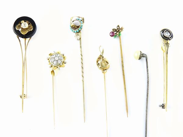 Seven silver and yellow gold various alloys tie pins with diamonds, pearls and different stones