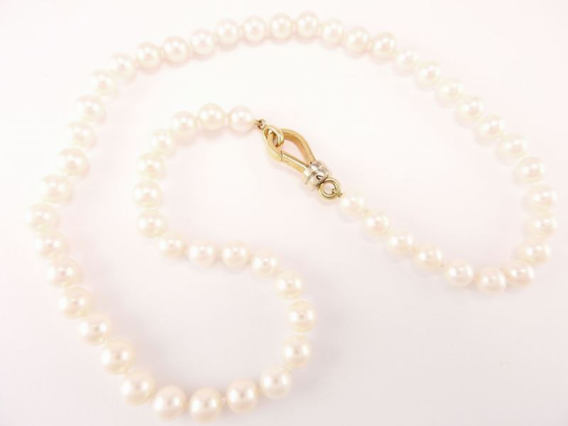 Collana Perle Coltivate Akoya con Fermezza Pomellato in Oro Giallo e Bianco