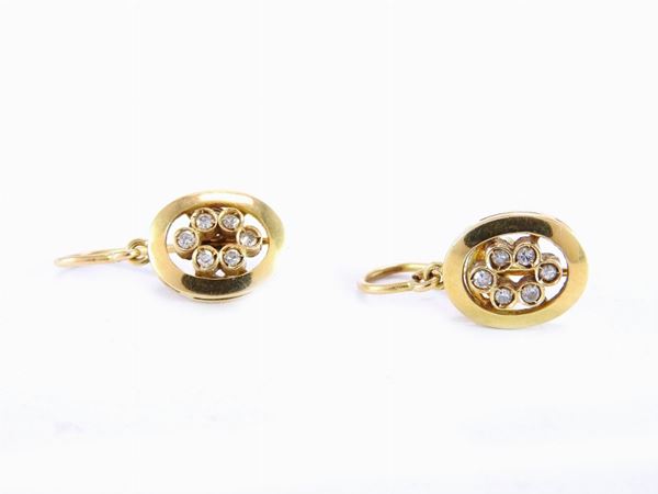 Yellow gold ear pendants with diamonds