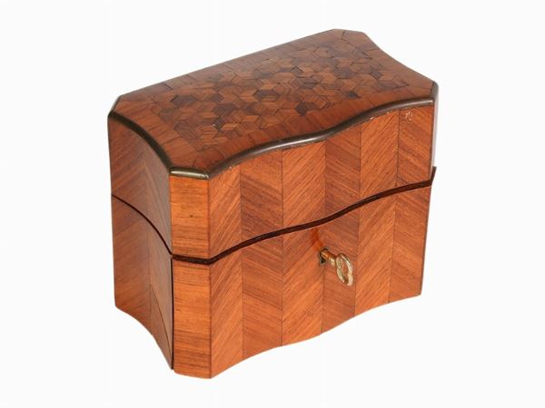 A Walnut and Rosewood Veneered Box With Travel Toilet Set