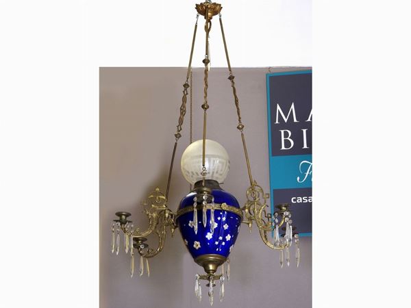 A Gilded Metal and Blue Glass Oil Chandelier