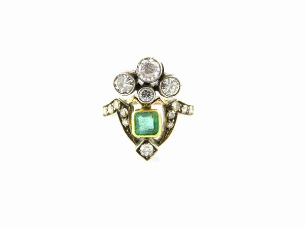 Silver and yellow gold ring with diamonds and emerald