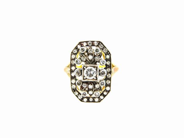 Silver and yellow gold ring with diamonds