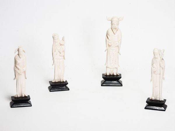 Four Carved Ivory Figures of Wisemen