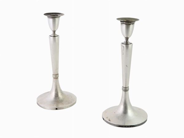 A Pair of Silver-plated Candlesticks
