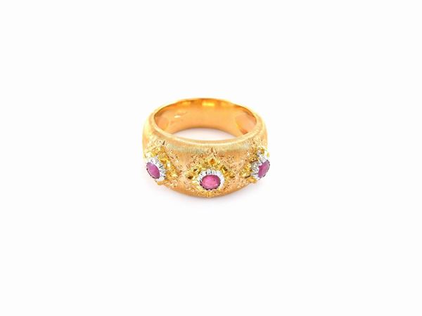 White and yellow gold band ring with rubies
