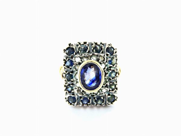 Yellow gold and silver ring with diamonds and sapphires