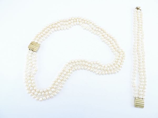 Demi parure three strands cultured freshwater baroque pearls necklace and bracelet