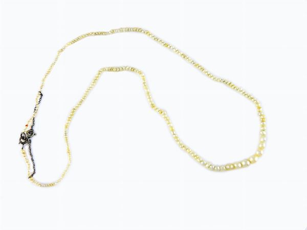 Graduated likely natural saltwater pearls necklace with silver clasp