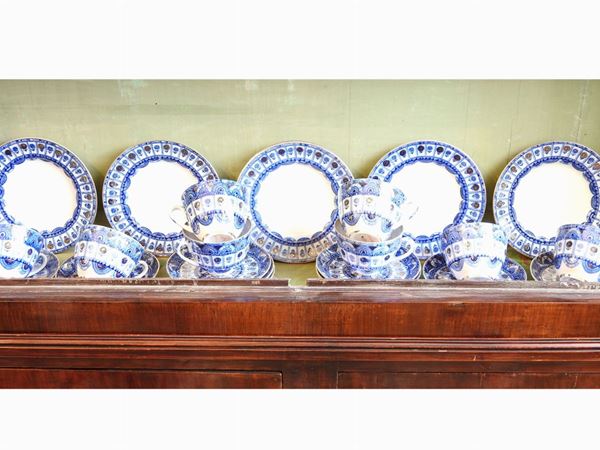 A Set of Twelve Painted Porcelain Tea Cups