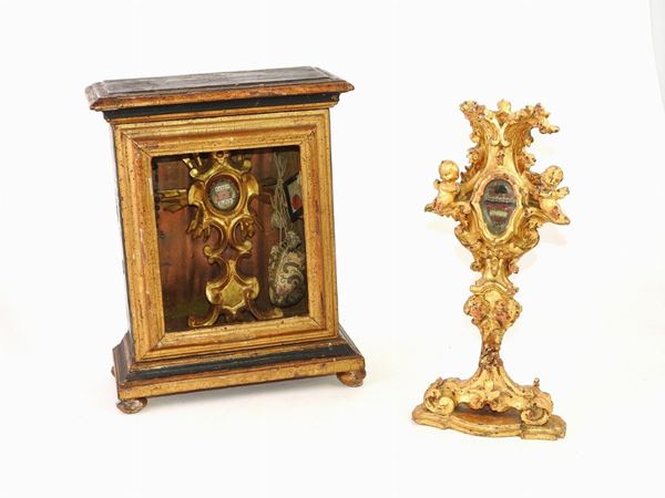 Due reliquiari in legno intagliato e dorato