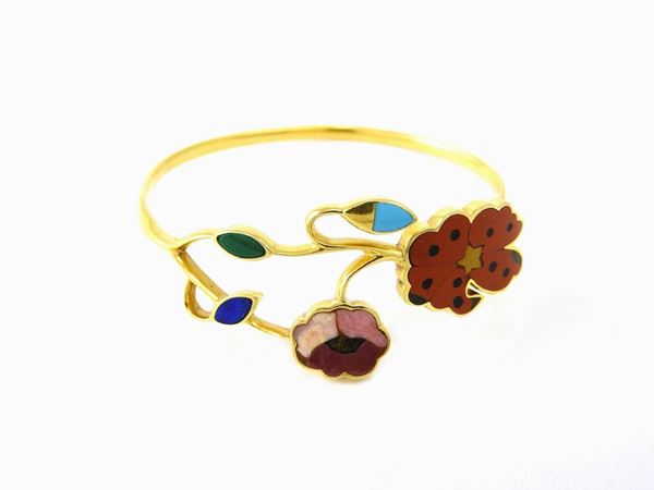 Yellow gold Gucci bangle with semiprecious stones