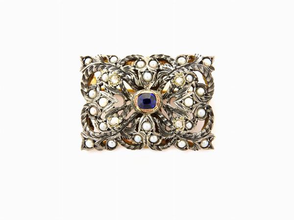 Yellow gold and silver clasp-brooch with sapphire and small pearls