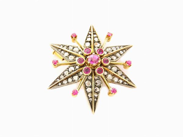 Yellow gold and silver brooch with diamonds and rubies