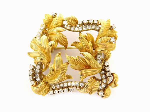 Yellow gold clasp-brooch with diamonds