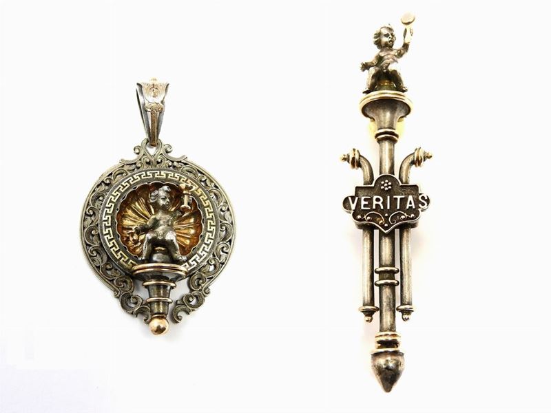 Una Spilla, un Pendente e un Paio di Orecchini in Parure Marchesini in Oro Giallo e Argento