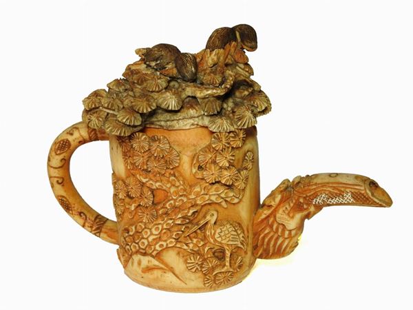 *A Small Carved Ivory Teapot