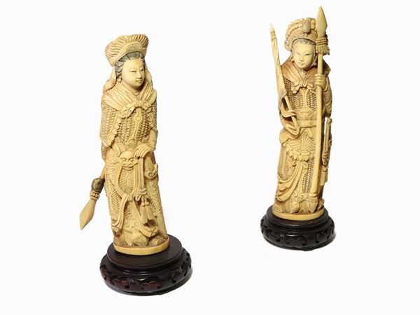 *A Pair of Carved Ivory Figures