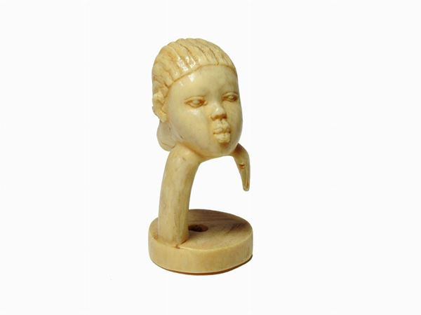 *An Ivory Woman's Head