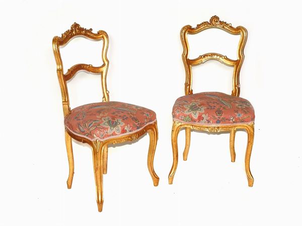 Coppia di sedie in legno intagliato e dorato  - Asta Arredi e dipinti antichi - I - Maison Bibelot - Casa d'Aste Firenze - Milano