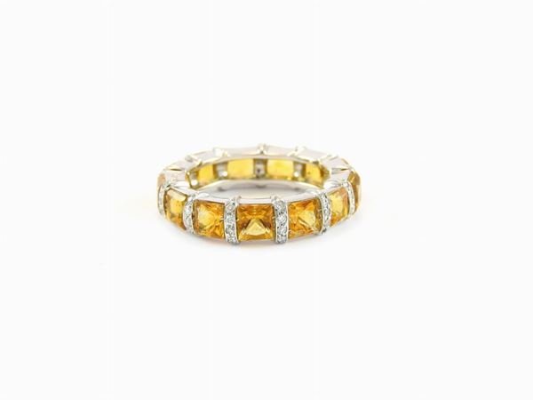 White gold ring with diamonds and citrine quartzes