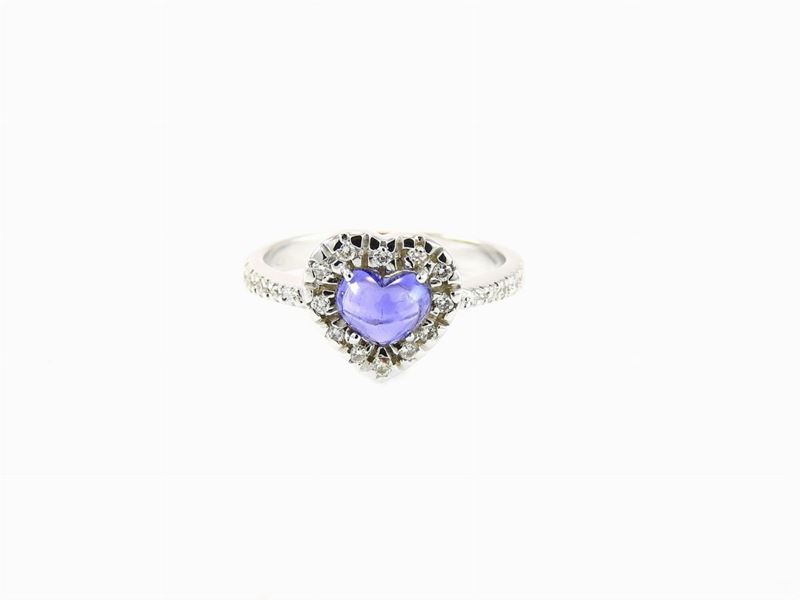 Anello a Margherita in Oro Bianco, Diamanti e Zaffiro